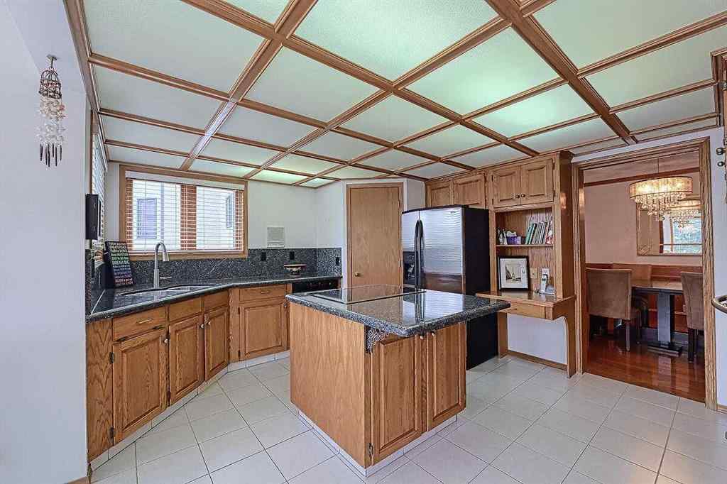 MLS® A2244657 - 115 Strathaven Circle SW in Strathcona Park Calgary, Residential