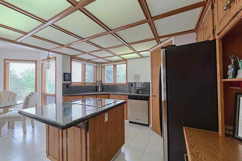 MLS® A2244657 - 115 Strathaven Circle SW in Strathcona Park Calgary, Residential