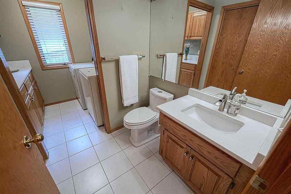 MLS® A2244657 - 115 Strathaven Circle SW in Strathcona Park Calgary, Residential