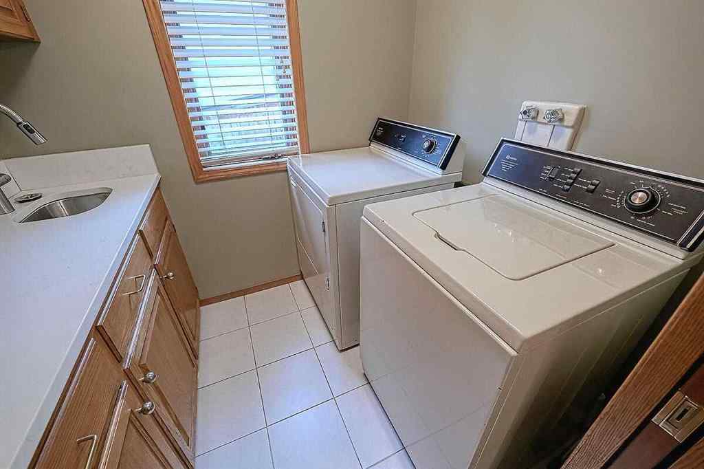 MLS® A2244657 - 115 Strathaven Circle SW in Strathcona Park Calgary, Residential
