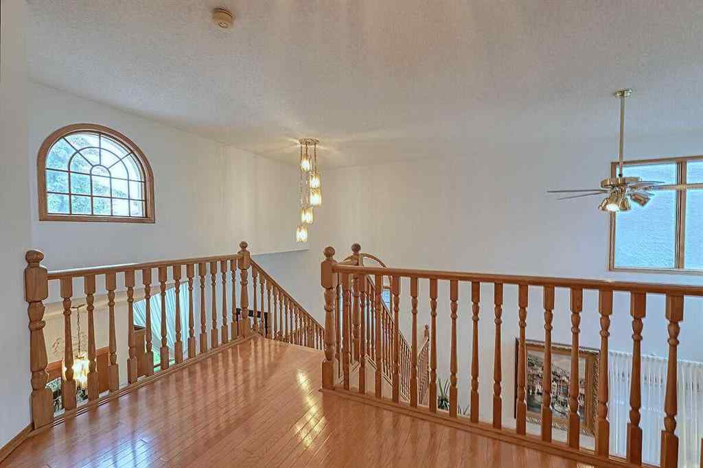 MLS® A2244657 - 115 Strathaven Circle SW in Strathcona Park Calgary, Residential