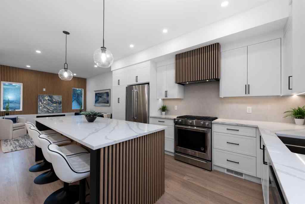 MLS® A2244664 - 97 23 Street NW in West Hillhurst Calgary, Residential
