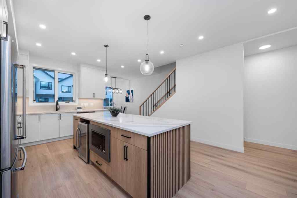 MLS® A2244664 - 97 23 Street NW in West Hillhurst Calgary, Residential