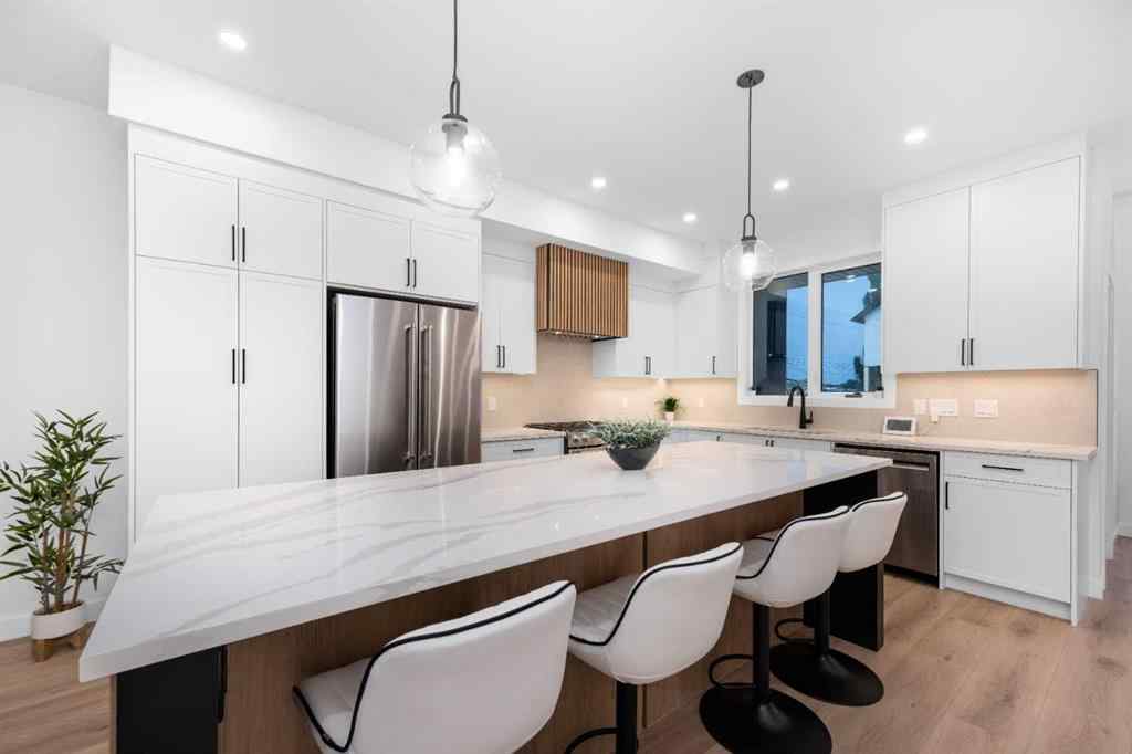 MLS® A2244664 - 97 23 Street NW in West Hillhurst Calgary, Residential