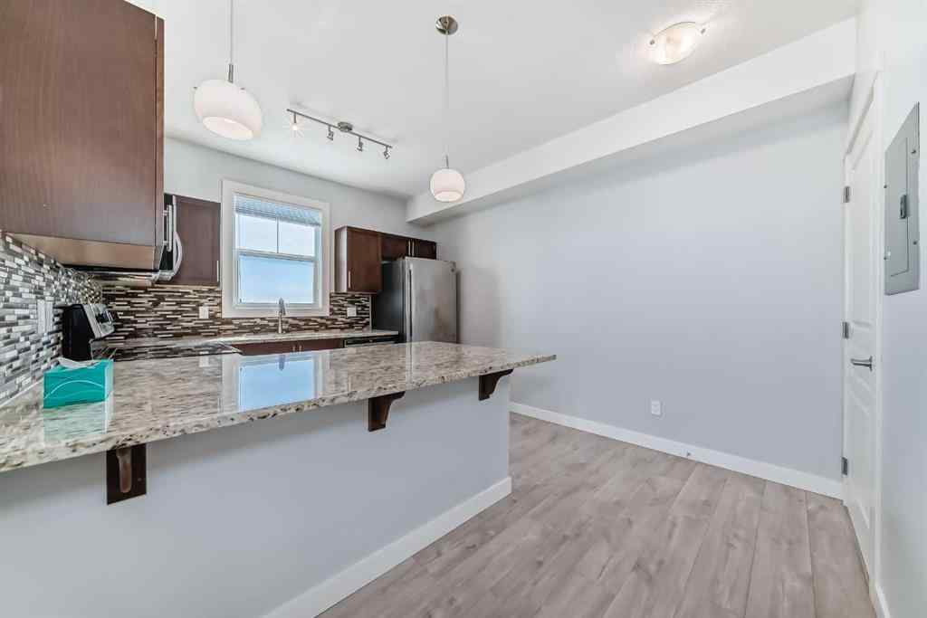 MLS® A2244673 - Unit #417 2300 Evanston Square NW in Evanston Calgary, Residential