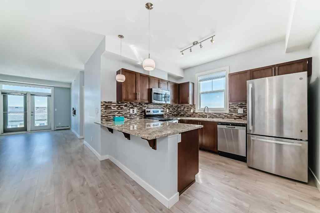 MLS® A2244673 - Unit #417 2300 Evanston Square NW in Evanston Calgary, Residential