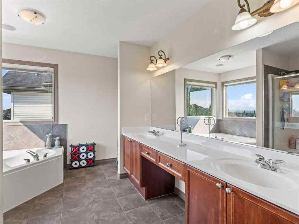 MLS® A2244699 - 95 Crystal Shores Road  in Crystal Shores Okotoks, Residential