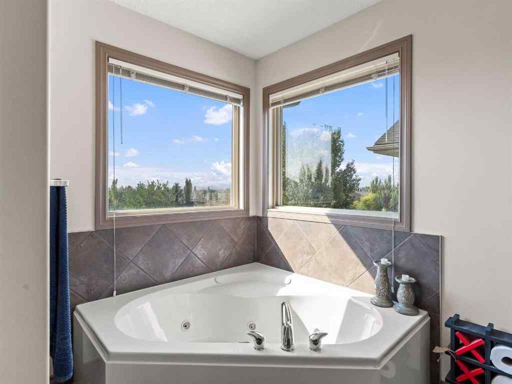 MLS® A2244699 - 95 Crystal Shores Road  in Crystal Shores Okotoks, Residential