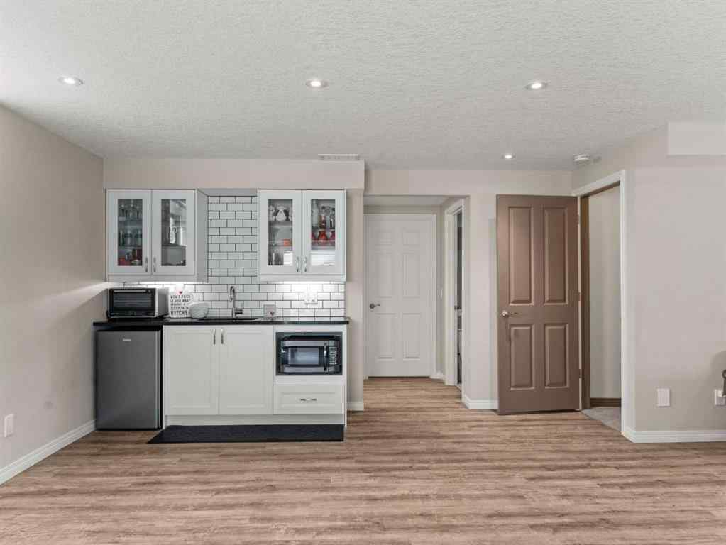 MLS® A2244699 - 95 Crystal Shores Road  in Crystal Shores Okotoks, Residential