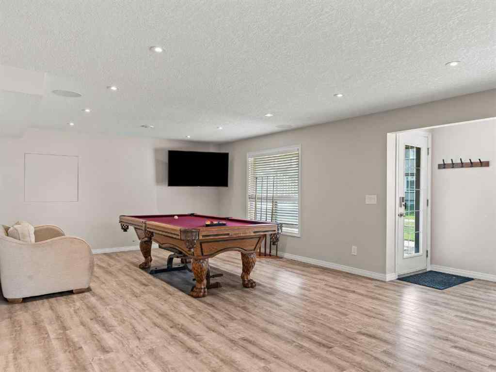 MLS® A2244699 - 95 Crystal Shores Road  in Crystal Shores Okotoks, Residential