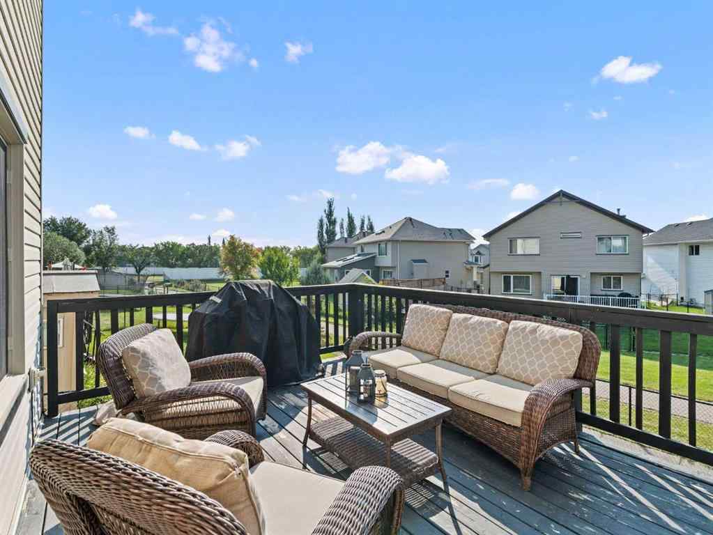 MLS® A2244699 - 95 Crystal Shores Road  in Crystal Shores Okotoks, Residential