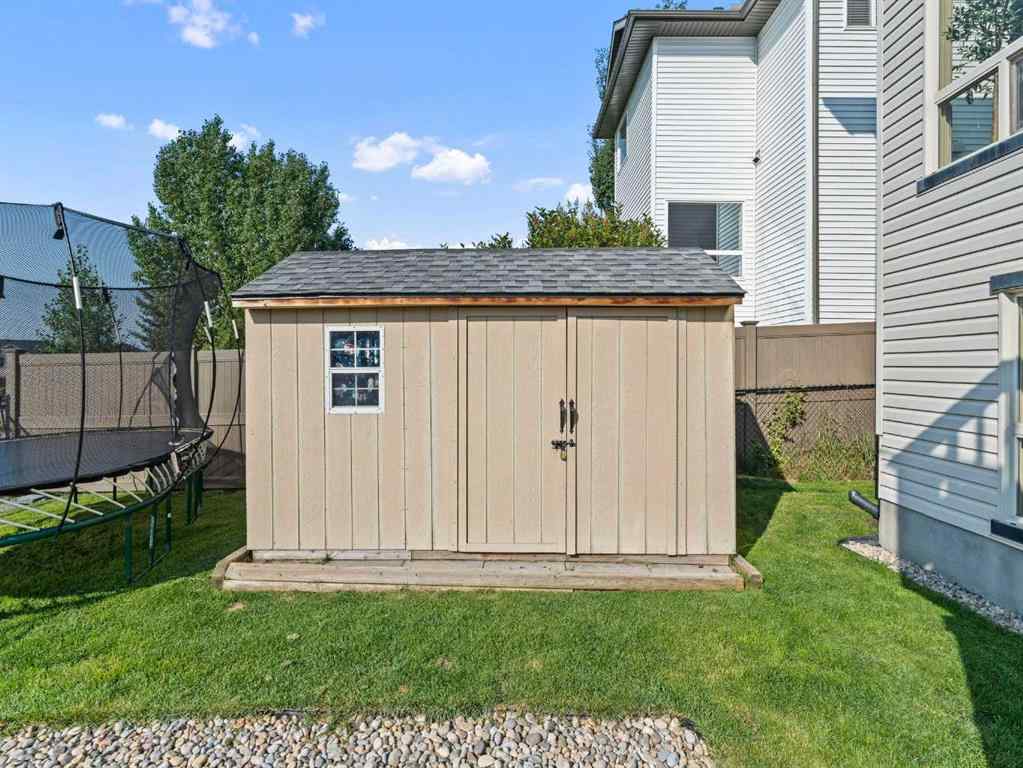 MLS® A2244699 - 95 Crystal Shores Road  in Crystal Shores Okotoks, Residential