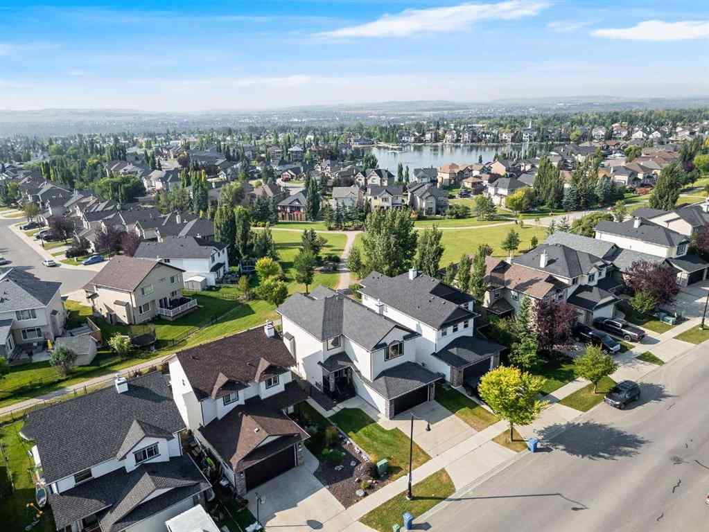 MLS® A2244699 - 95 Crystal Shores Road  in Crystal Shores Okotoks, Residential
