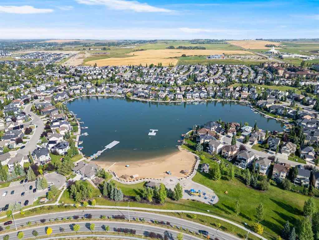 MLS® A2244699 - 95 Crystal Shores Road  in Crystal Shores Okotoks, Residential