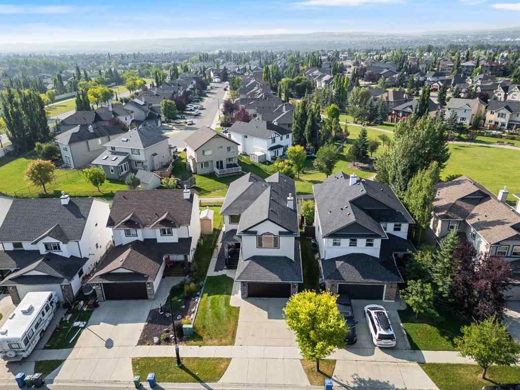 MLS® A2244699 - 95 Crystal Shores Road  in Crystal Shores Okotoks, Residential