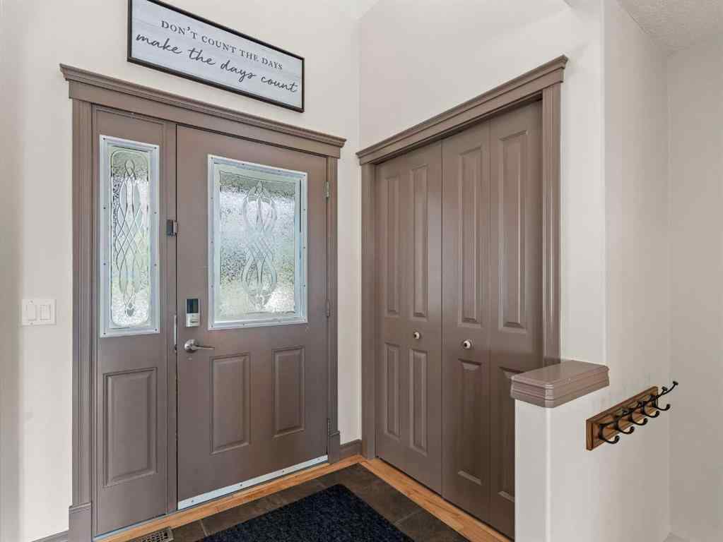 MLS® A2244699 - 95 Crystal Shores Road  in Crystal Shores Okotoks, Residential