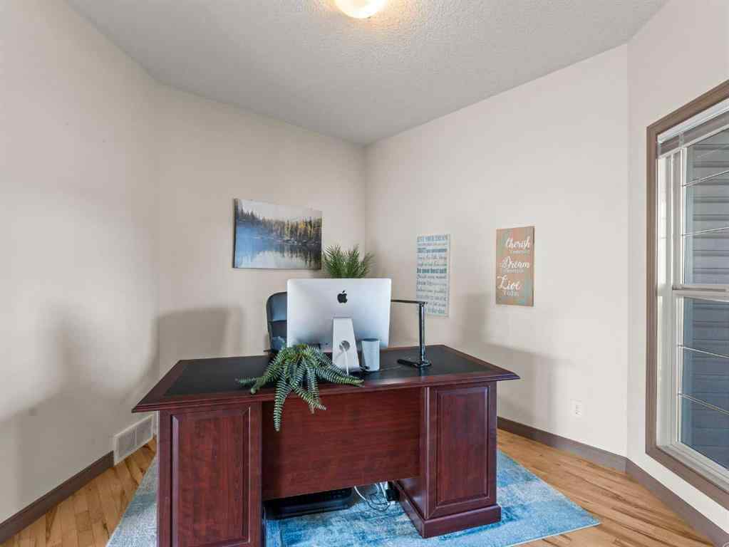 MLS® A2244699 - 95 Crystal Shores Road  in Crystal Shores Okotoks, Residential