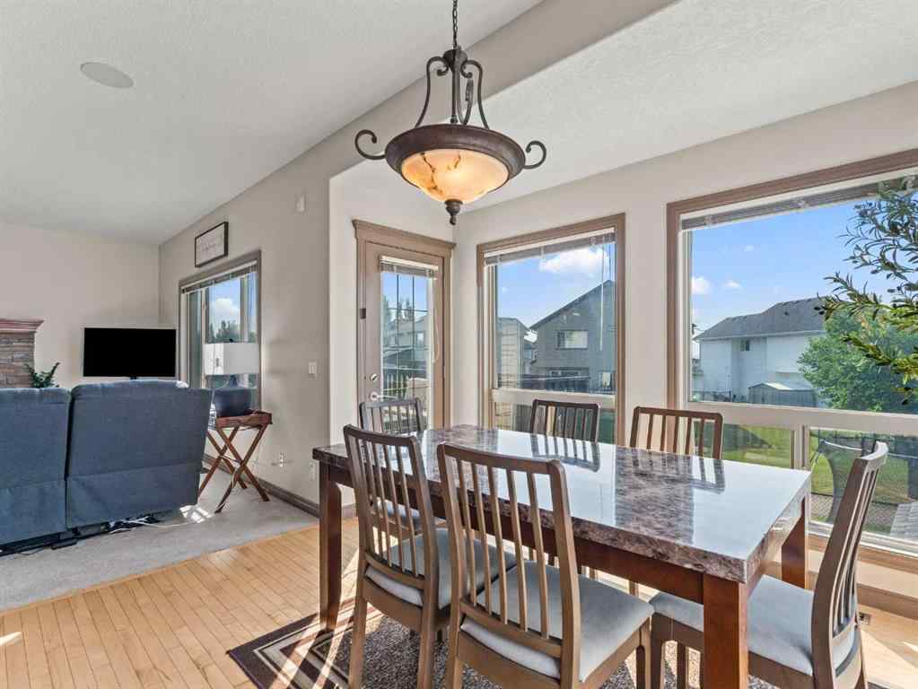 MLS® A2244699 - 95 Crystal Shores Road  in Crystal Shores Okotoks, Residential