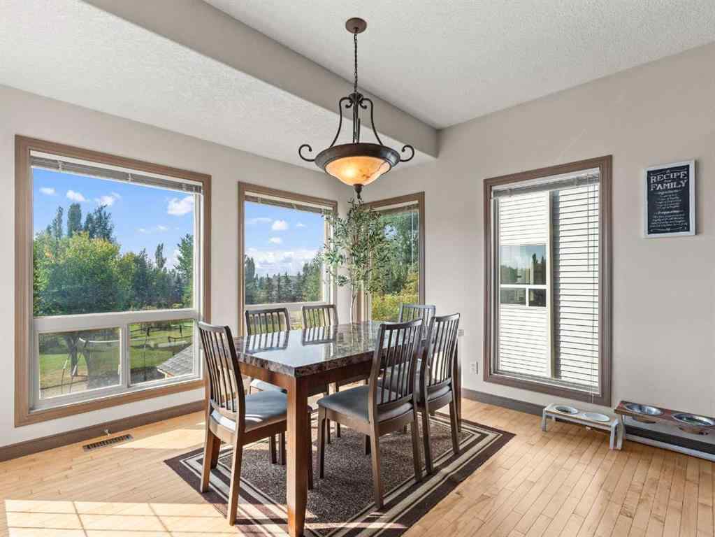 MLS® A2244699 - 95 Crystal Shores Road  in Crystal Shores Okotoks, Residential