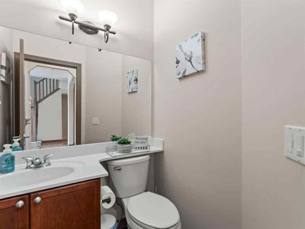 MLS® A2244699 - 95 Crystal Shores Road  in Crystal Shores Okotoks, Residential