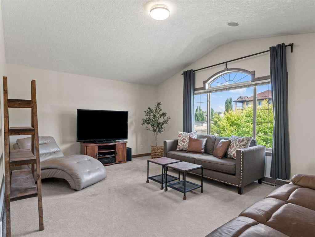 MLS® A2244699 - 95 Crystal Shores Road  in Crystal Shores Okotoks, Residential