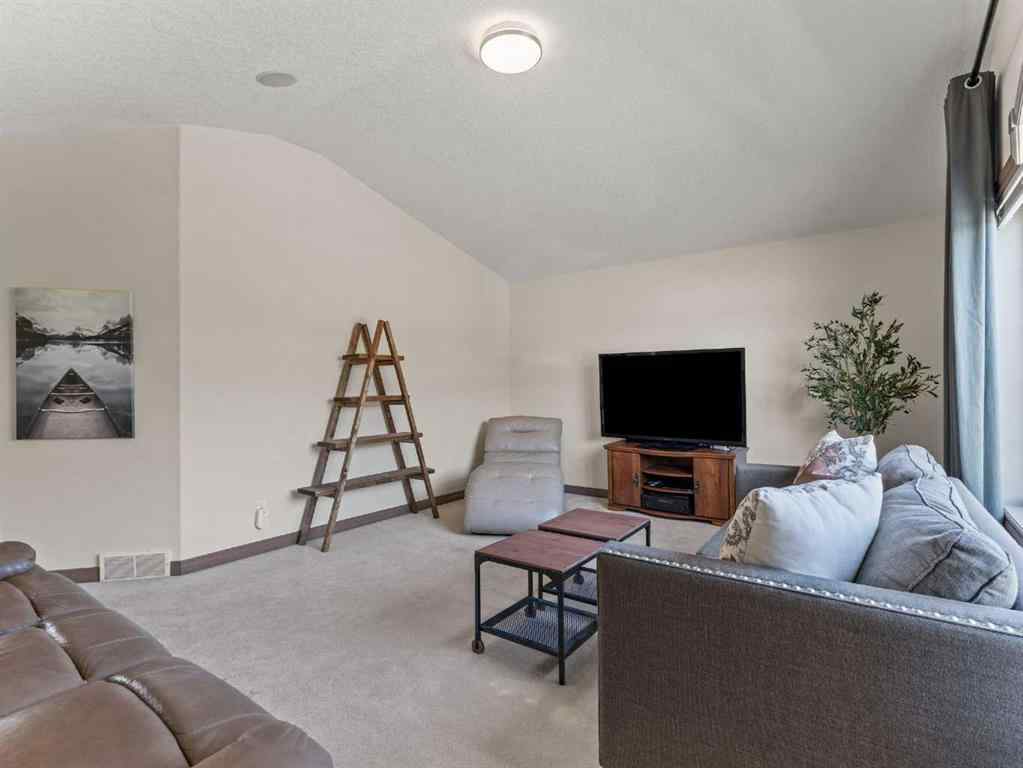 MLS® A2244699 - 95 Crystal Shores Road  in Crystal Shores Okotoks, Residential