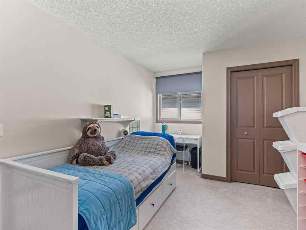 MLS® A2244699 - 95 Crystal Shores Road  in Crystal Shores Okotoks, Residential