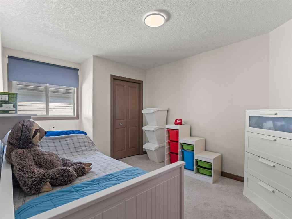 MLS® A2244699 - 95 Crystal Shores Road  in Crystal Shores Okotoks, Residential
