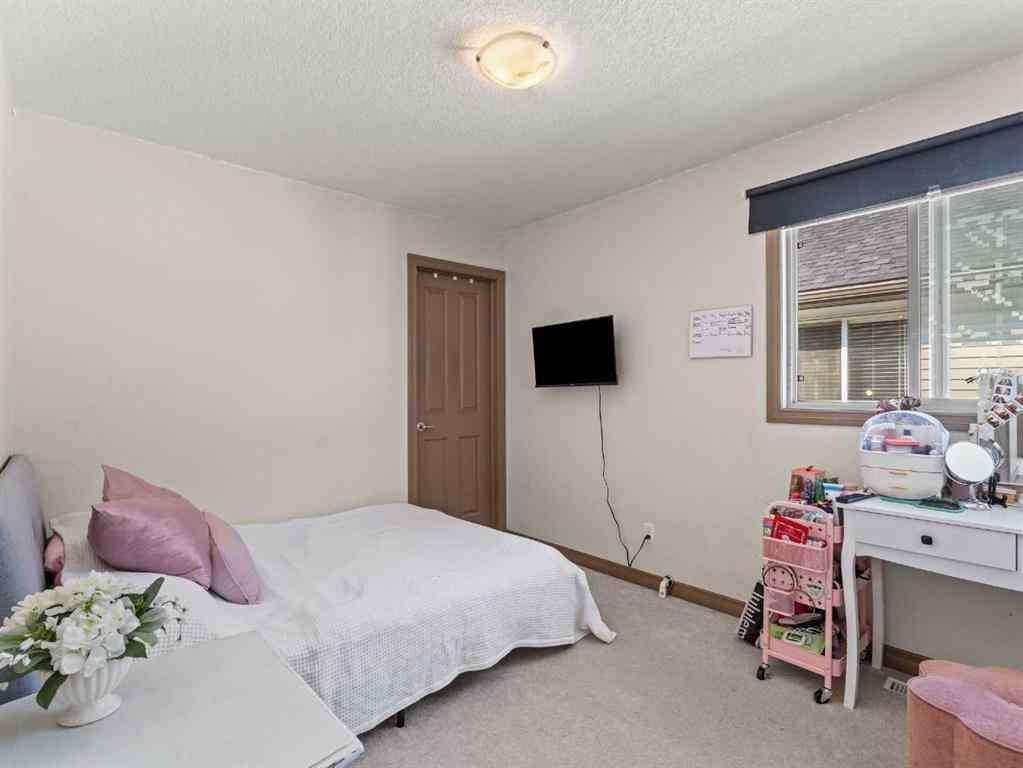 MLS® A2244699 - 95 Crystal Shores Road  in Crystal Shores Okotoks, Residential