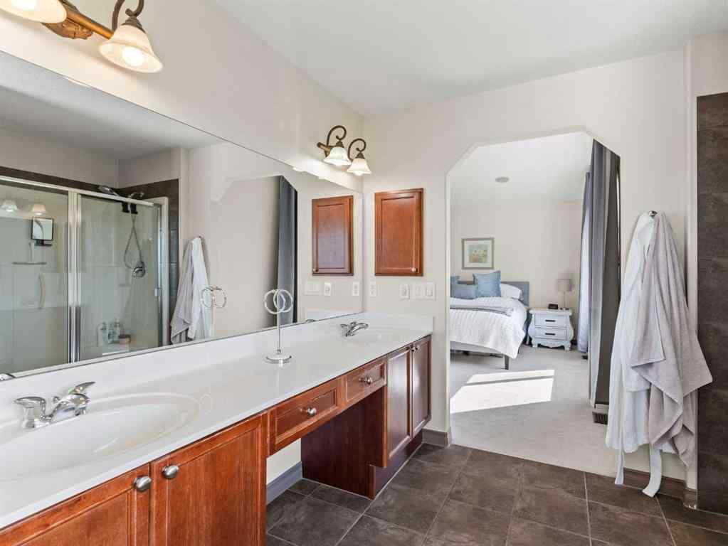 MLS® A2244699 - 95 Crystal Shores Road  in Crystal Shores Okotoks, Residential