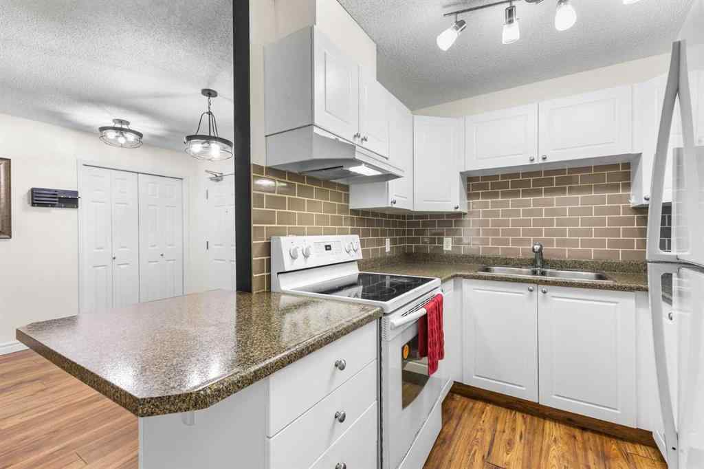 MLS® A2244735 - Unit #107 9 Country Village Bay NE in Country Hills Village Calgary, Residential