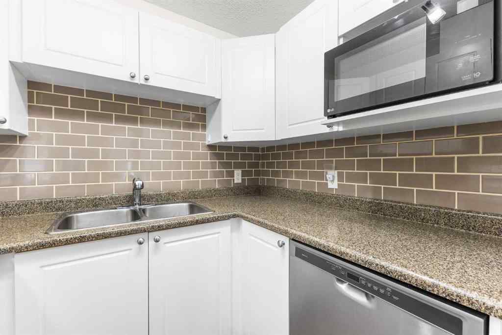 MLS® A2244735 - Unit #107 9 Country Village Bay NE in Country Hills Village Calgary, Residential