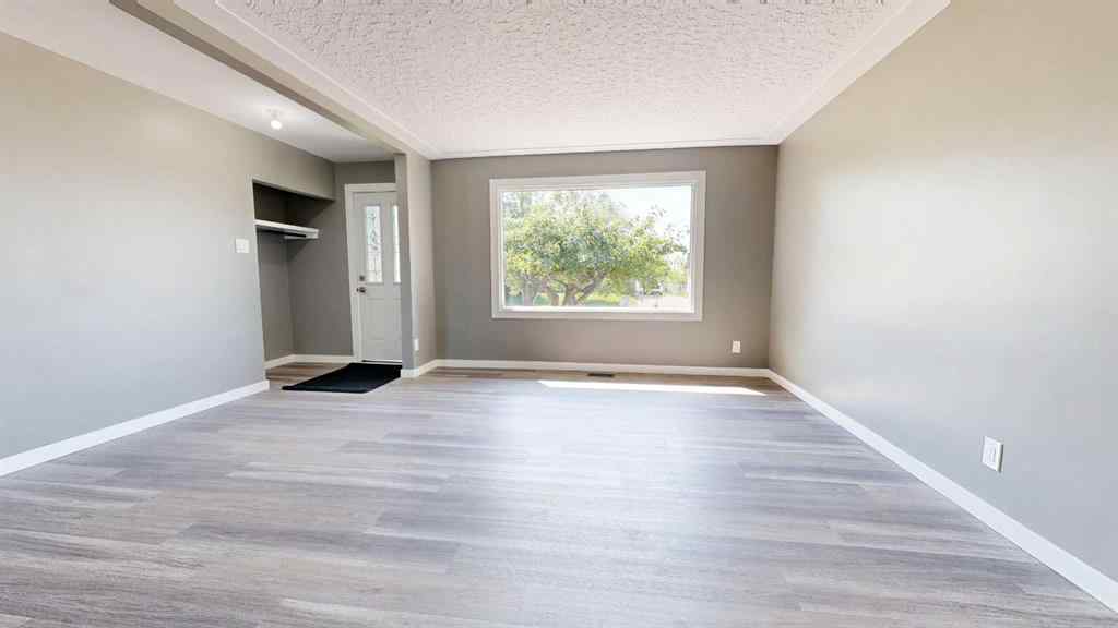 MLS® A2244801 - 9514 99 Avenue  in Smith Grande Prairie, Residential