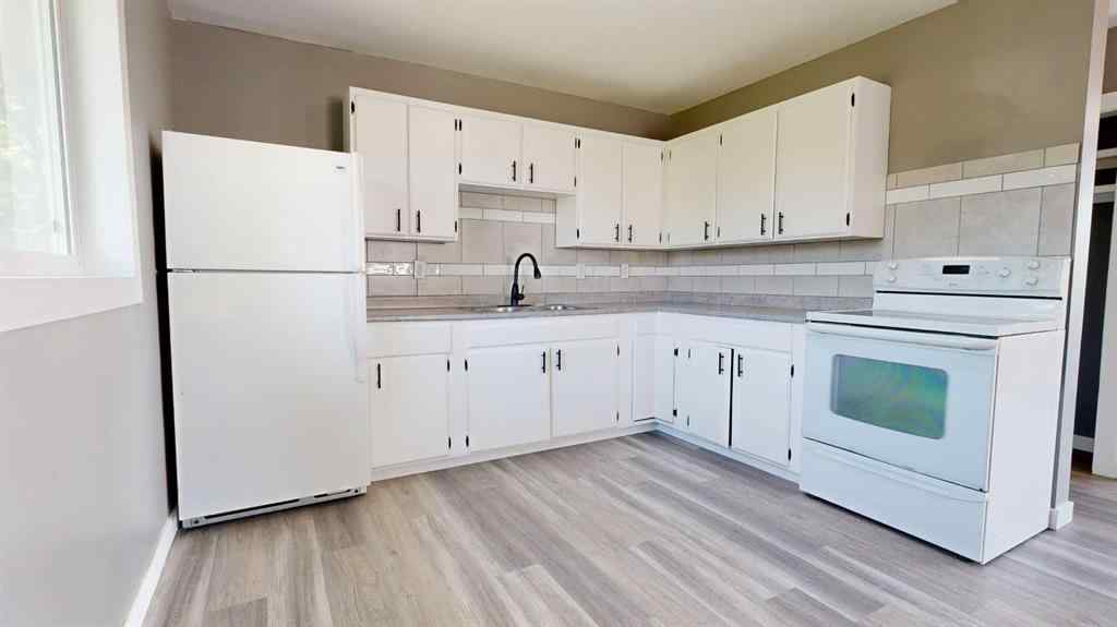 MLS® A2244801 - 9514 99 Avenue  in Smith Grande Prairie, Residential