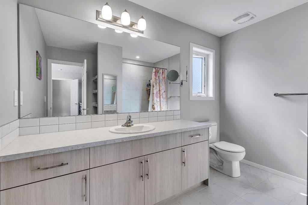 MLS® A2244821 - 329 Windbury Road SW in South Windsong Airdrie, Residential