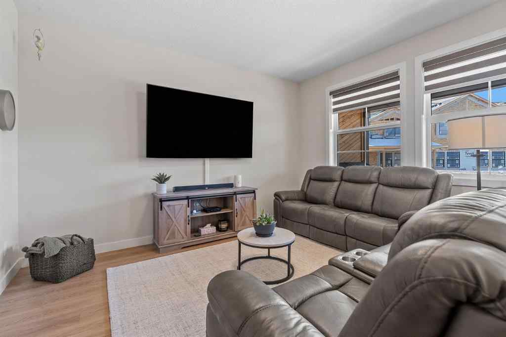 MLS® A2244851 - Unit #204 201 Cooperswood Green SW in Coopers Crossing Airdrie, Residential