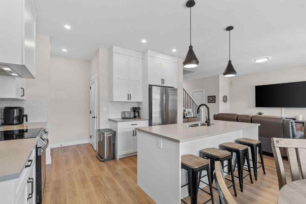 MLS® A2244851 - Unit #204 201 Cooperswood Green SW in Coopers Crossing Airdrie, Residential