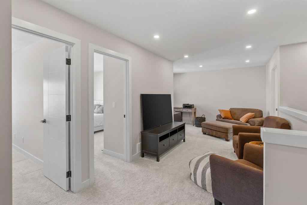 MLS® A2244851 - Unit #204 201 Cooperswood Green SW in Coopers Crossing Airdrie, Residential