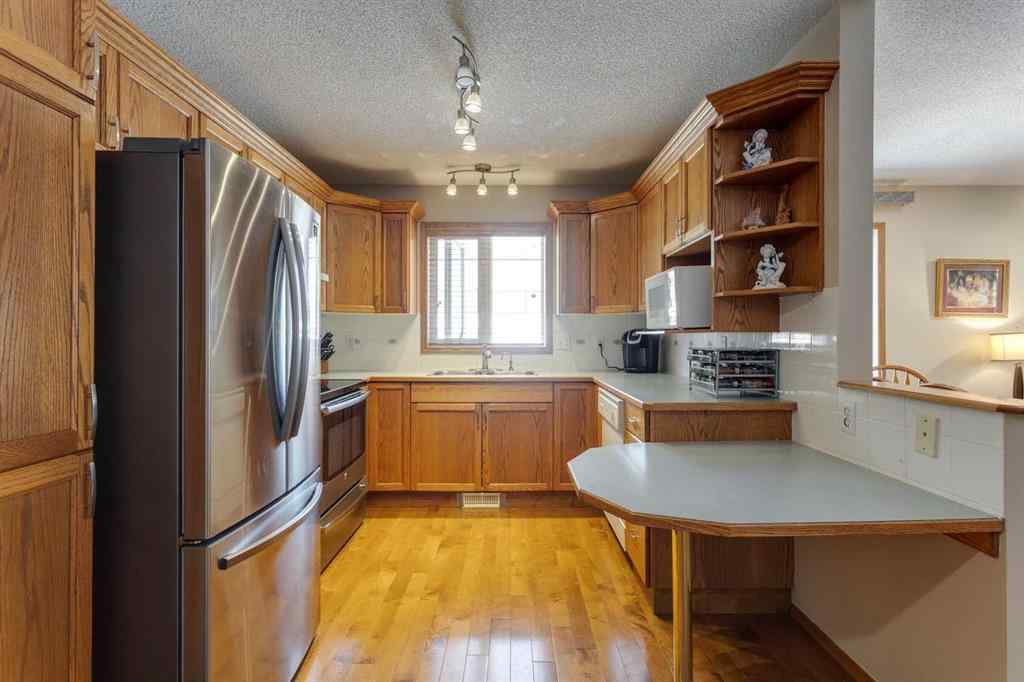 MLS® A2244867 - 52 Harvest Lake Villas NE in Harvest Hills Calgary, Residential
