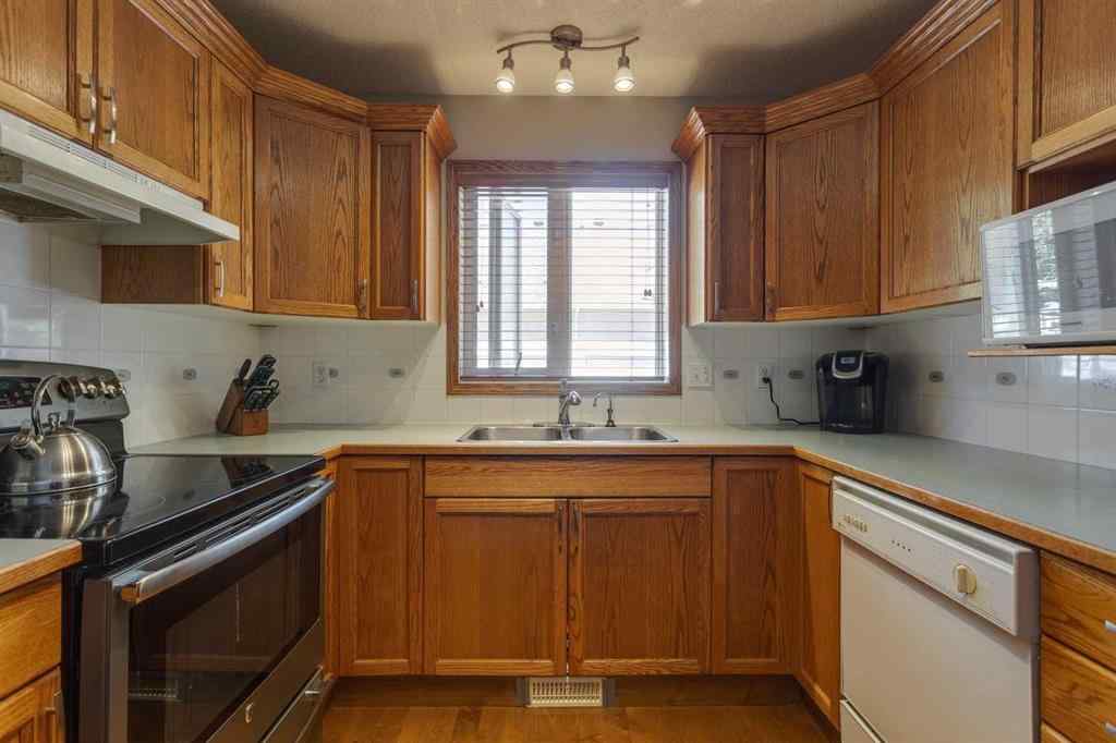 MLS® A2244867 - 52 Harvest Lake Villas NE in Harvest Hills Calgary, Residential