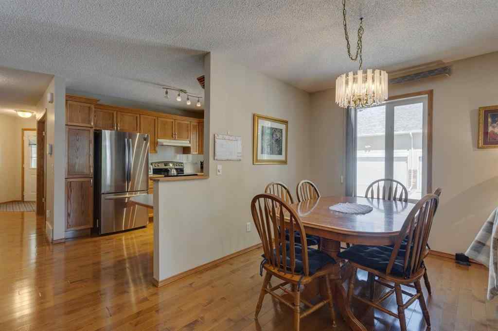 MLS® A2244867 - 52 Harvest Lake Villas NE in Harvest Hills Calgary, Residential
