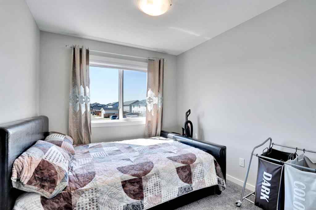 MLS® A2244887 - 47 Lake Street  in Liberty Landing Rural Red Deer County, Residential