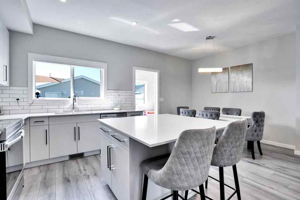 MLS® A2244887 - 47 Lake Street  in Liberty Landing Rural Red Deer County, Residential