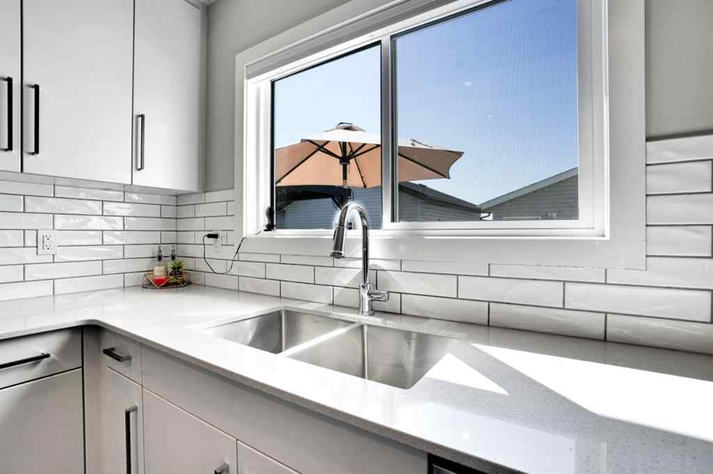 MLS® A2244887 - 47 Lake Street  in Liberty Landing Rural Red Deer County, Residential