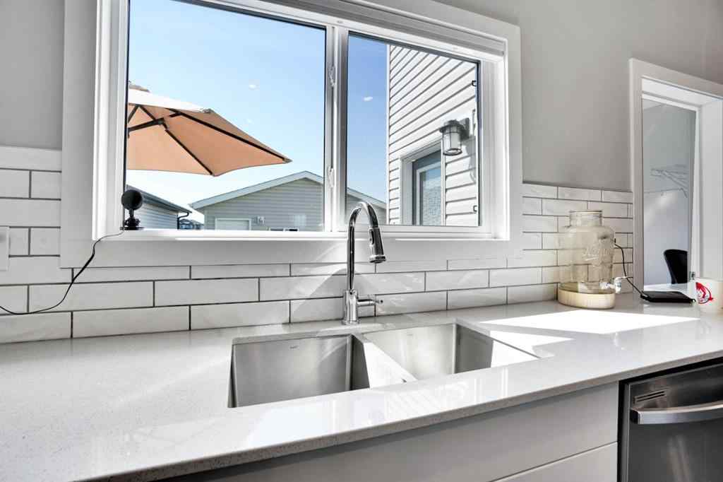 MLS® A2244887 - 47 Lake Street  in Liberty Landing Rural Red Deer County, Residential