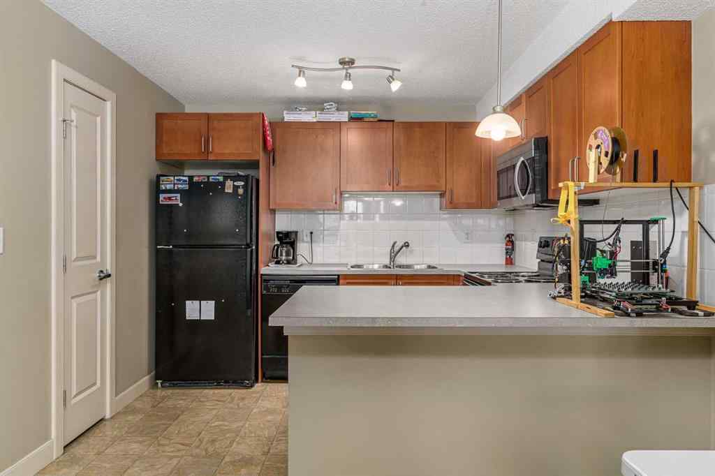 MLS® A2244902 - Unit #204 156 Country Village Circle NE in Country Hills Village Calgary, Residential
