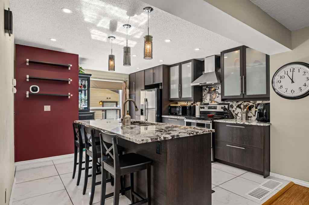 MLS® A2244910 - 150 Shawmeadows Road SW in Shawnessy Calgary, Residential