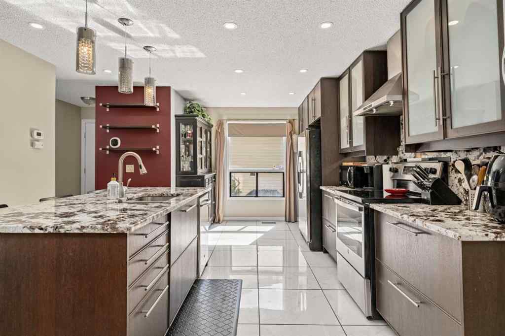 MLS® A2244910 - 150 Shawmeadows Road SW in Shawnessy Calgary, Residential