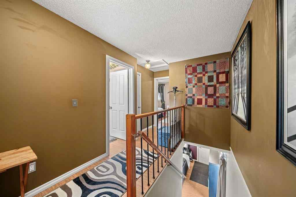 MLS® A2244910 - 150 Shawmeadows Road SW in Shawnessy Calgary, Residential