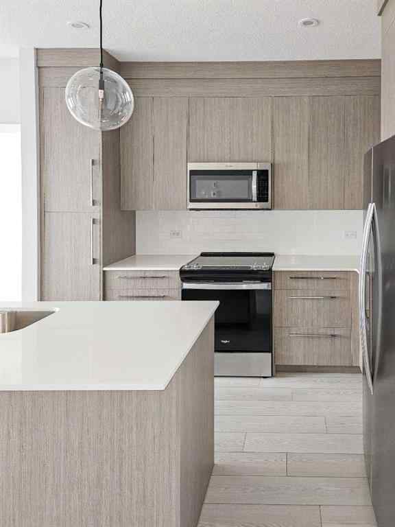 MLS® A2244913 - Unit #2413 111 Wolf Creek Drive SE in Wolf Willow Calgary, Residential